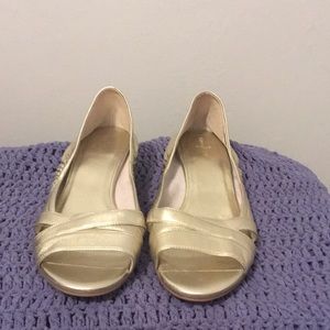 Cole Haan Gold Leather slight wedge beautiful dressy shoes.